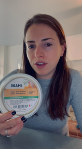 Woman reviewing Brami lupini bean dip