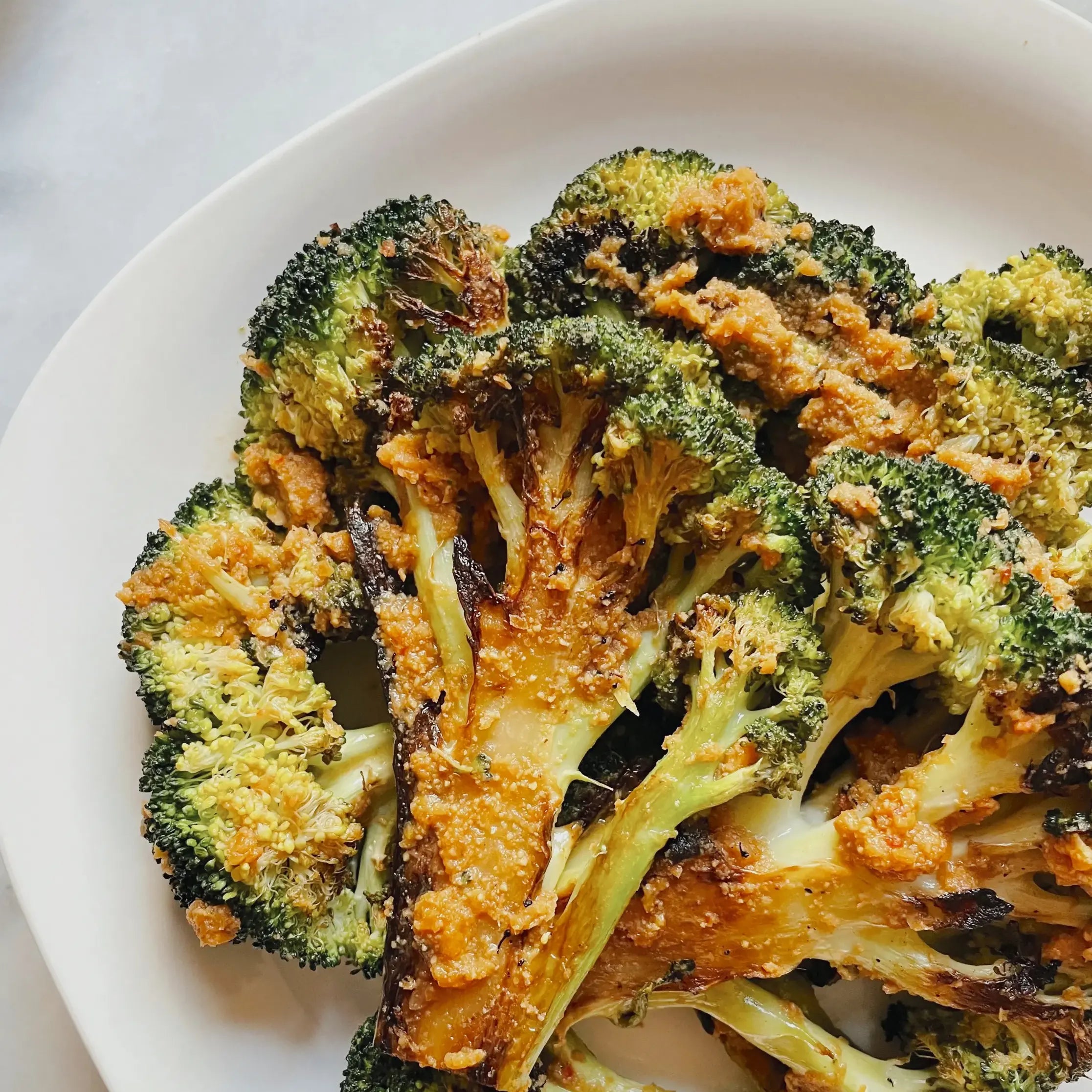 ROASTED BROCCOLI WITH SPICY HUMMUS SAUCE