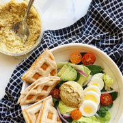 salad with avocado, tomatoes, eggs and lupini dip